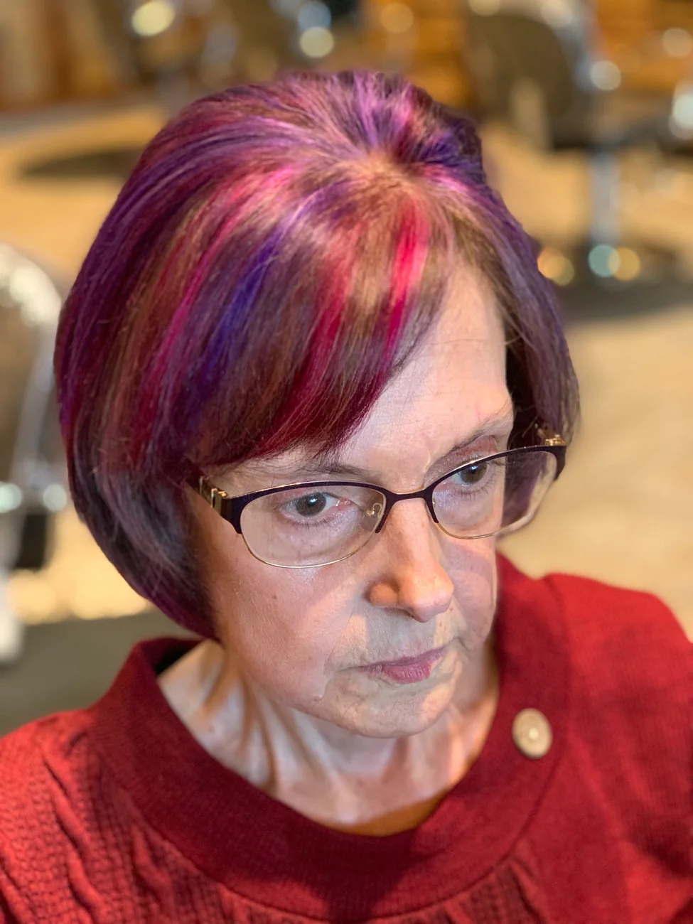 Short vivid red and purple hair color