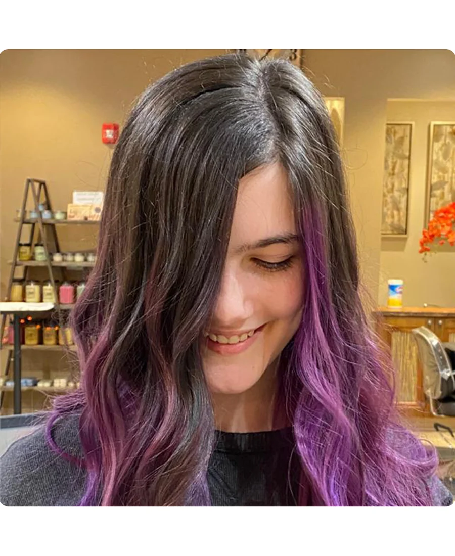 Vivid purple hair color at ArtiZan Salon