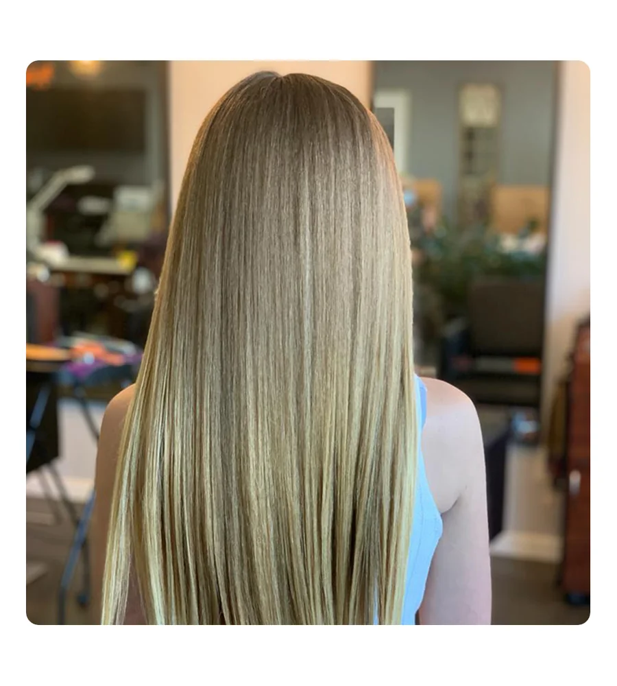 Long natural-looking hair extension inspiration at ArtiZan Salon